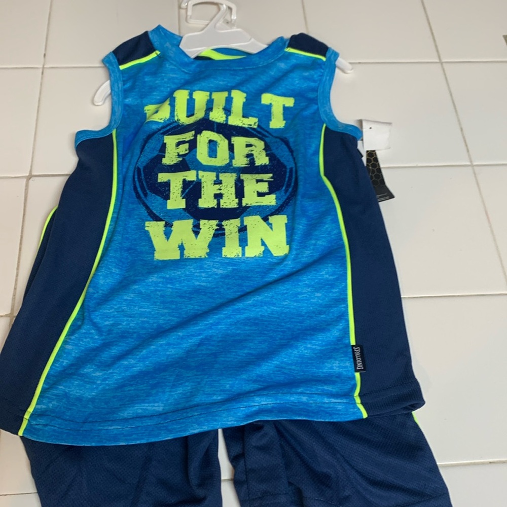 Size 4 little boys basketball style shirt set. Spalding brand  blue. NWT